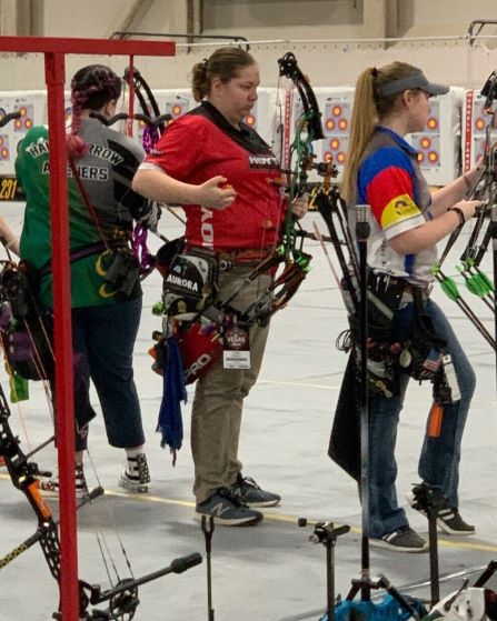 two girls with archery gear